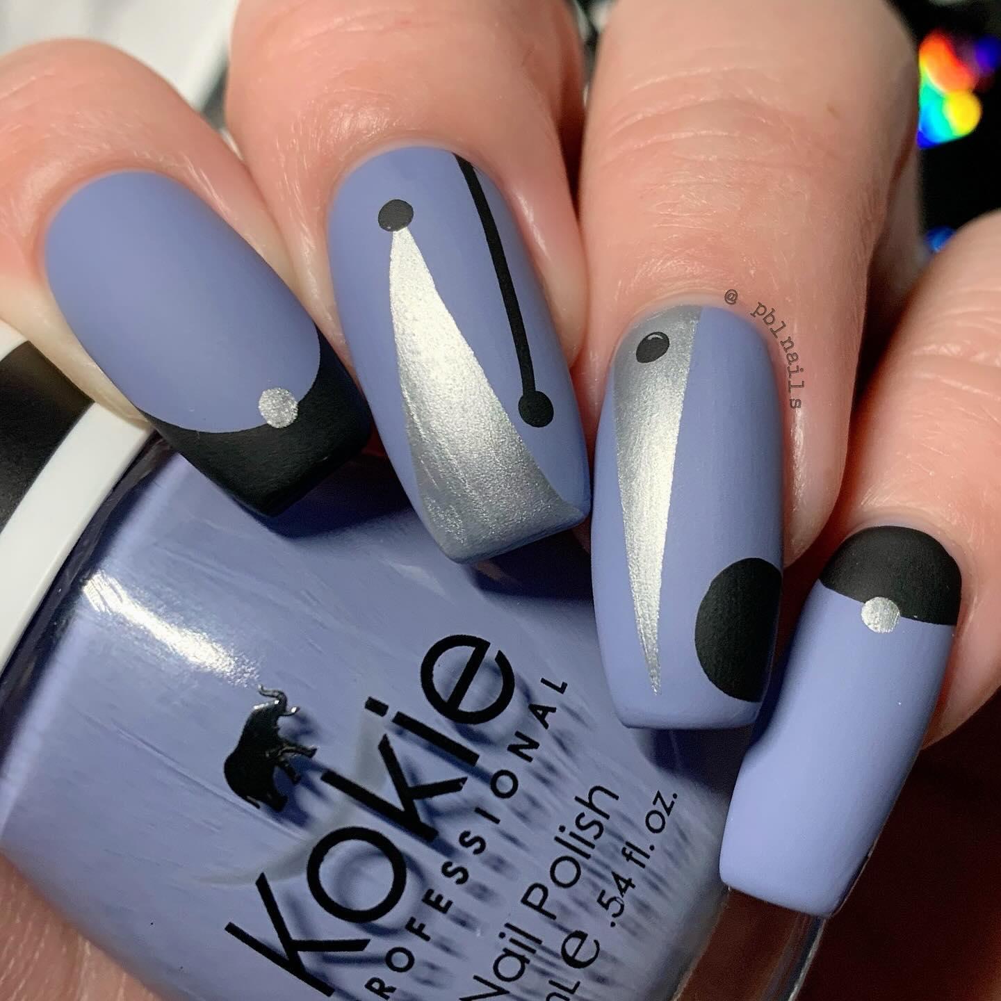 30 Latest Geometric Designs to Try In 2024! 28 Cosmic Play: The Geometric Design with the Trio of Colors