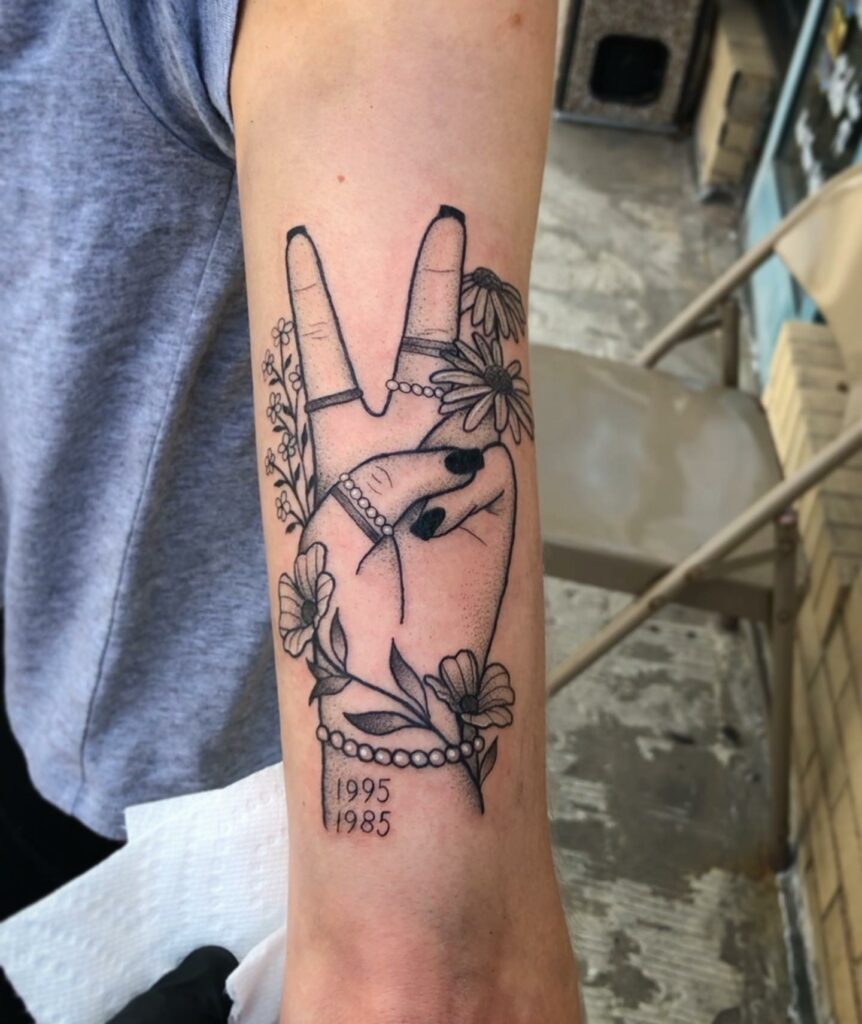 Amazing Peace Sign Tattoo Ideas To Inspire You in 2024 13 Fingers Up Peace Sign Tattoos