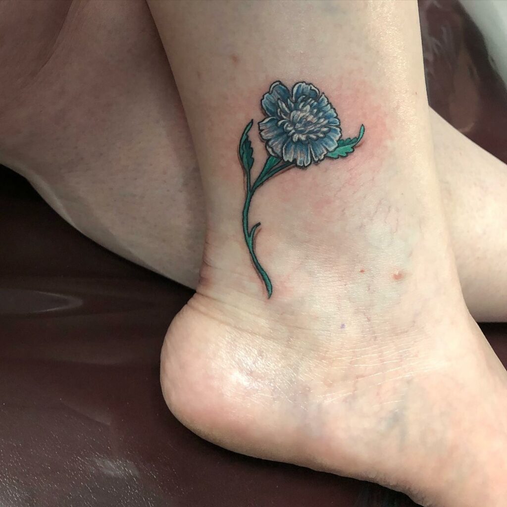 AMAZING MARIGOLD TATTOO DESIGNS & MEANINGS TO INSPIRE YOU IN 2024 12 Signet Marigold Tattoo