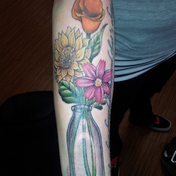 AMAZING TULIP TATTOO DESIGNS + MEANINGS TO INSIRE YOU IN 2024 17 Orange Tulip Tattoos