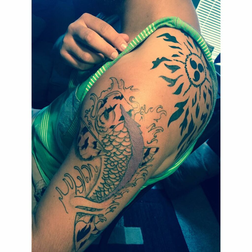 55 Spellbinding Sasuke Tattoo Designs in 2024 36 A Fusion of Koi Fish and Curse Mark