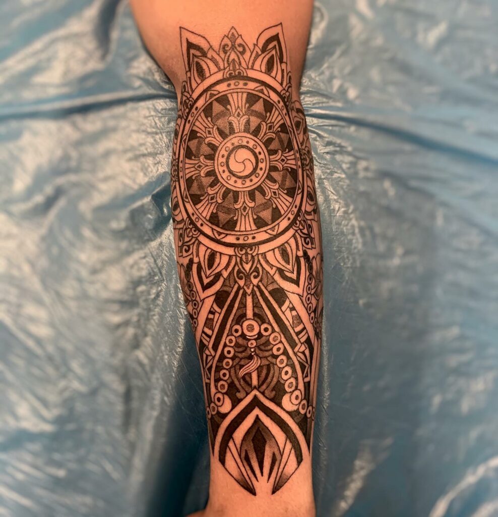Top 20 Symbolic Tattoos For Men in 2024 14 Dharmachakra Tattoo