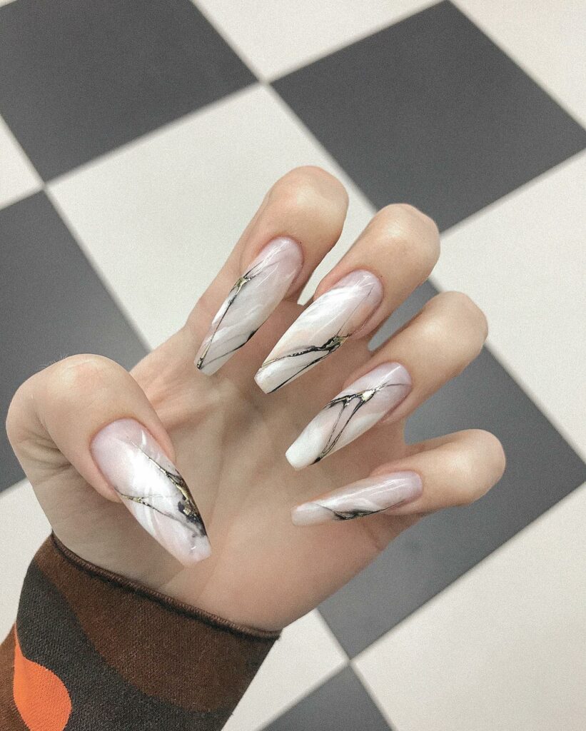 Embrace Elegance with 15 White Marble Nail Designs in 2024 18 Long White Marble Coffin Nails With Black Design