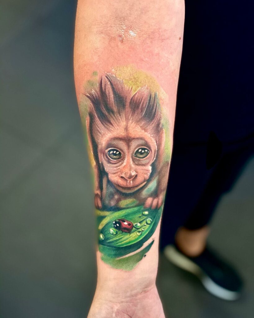 AMAZING MONKEY TATTOO DESIGNS + MEANINGS TO INSPIRE YOU IN 2024 10 Baby Monkey Tattoo