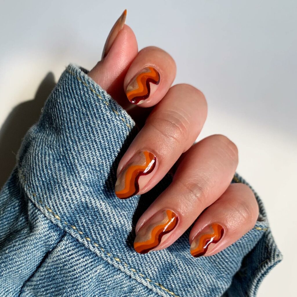 20 BEST 70S NAIL DESIGNS TO TRY IN 2024! 18 Fall-Inspired 70s Swirl Nails