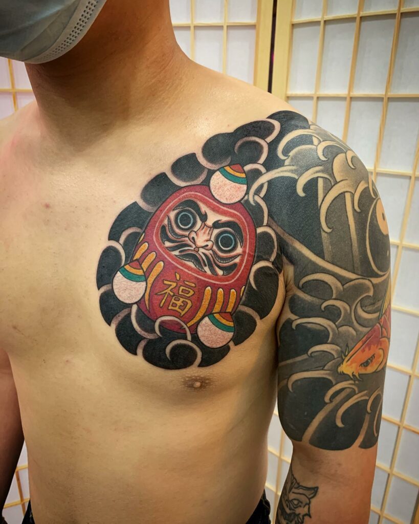 AMAZING DARUMA DOLL TATTOOS DESIGNS & MEANINGS - UPDATED FOR 2024 12 Daruma Doll & Koi Tattoo Meaning