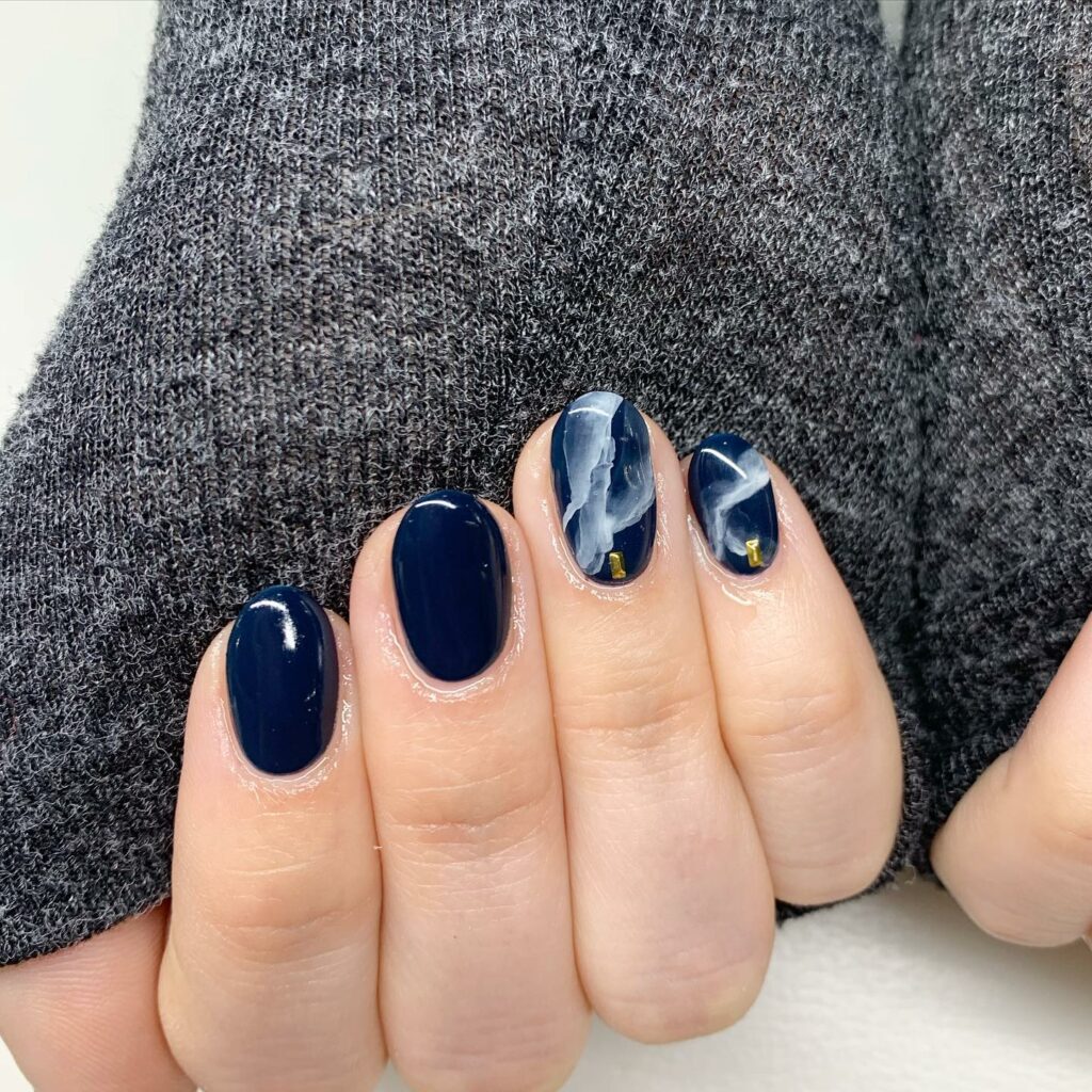 35 Latest Dark Blue Nail Designs To Try In 2024! 24 Dark Blue Marble Nails