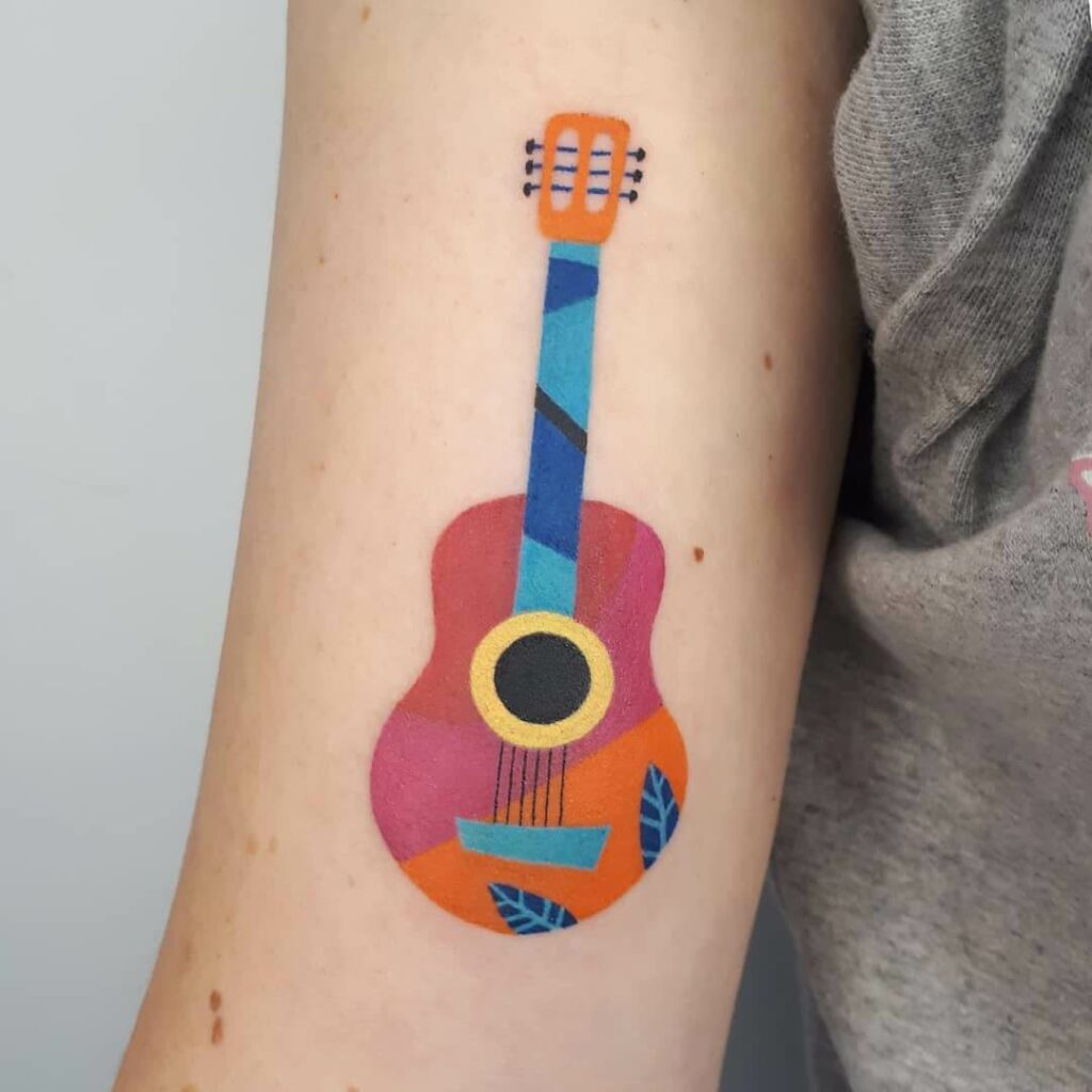 11+ Simple Guitar Tattoo Designs That Will Blow Your Mind! 10 Simple Guitar Tattoo