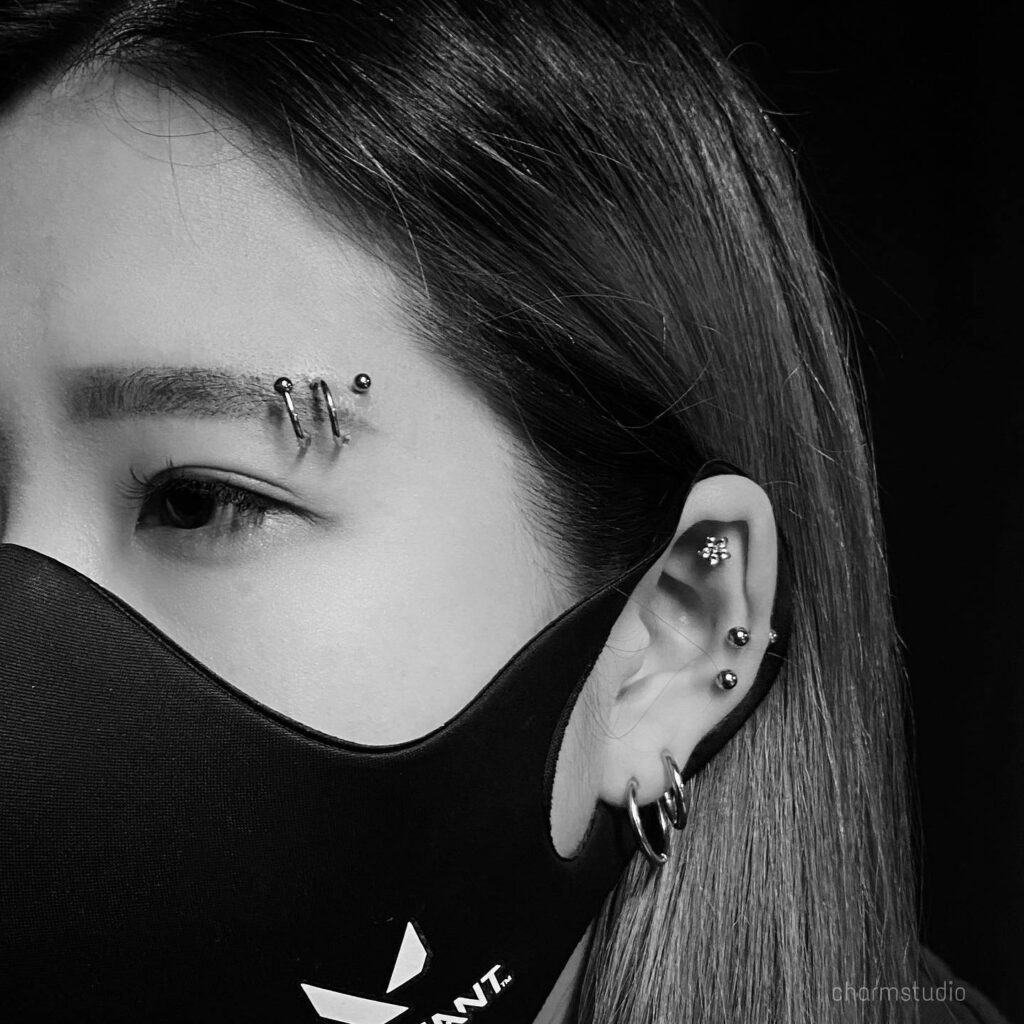 Eyebrow Piercing Ideas & Styles For 2024 17 Spiral Eyebrow Piercing