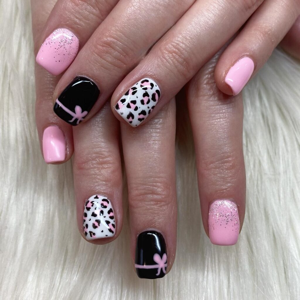 Indulge in 35 Black And Pink Nail Designs To Try in 2024 30 Sharp as a Leopard, Soft as a Flower