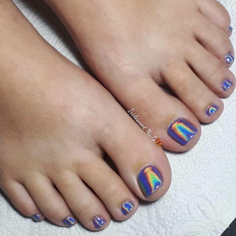 25 Latest Purple Pedicure Designs to Try In 2024! 31 Iridescent Holographic Purple Pedicure