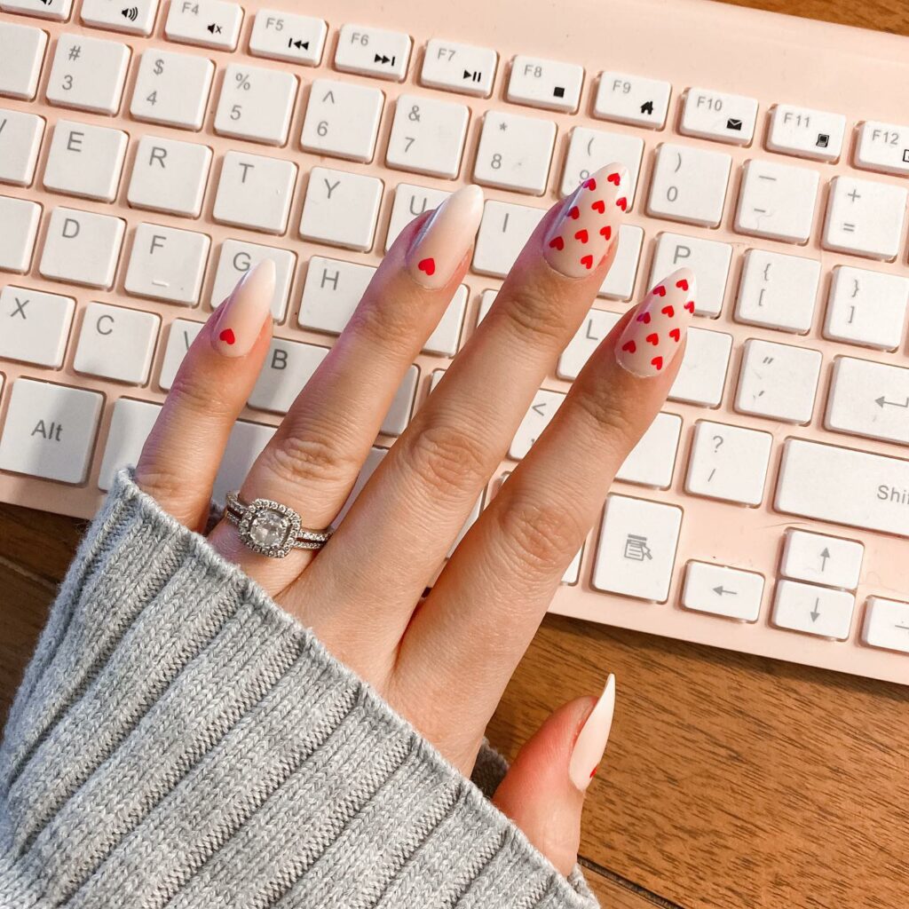 20 Latest February Nail Designs To Try In 2024! 10 February Almond Nails With Tiny Heart Design