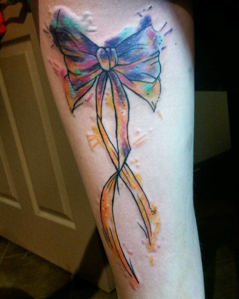 11+ Thigh Bow Tattoo Ideas That Will Blow Your Mind! 11 Watercolor Bow Tattoo On The Thigh