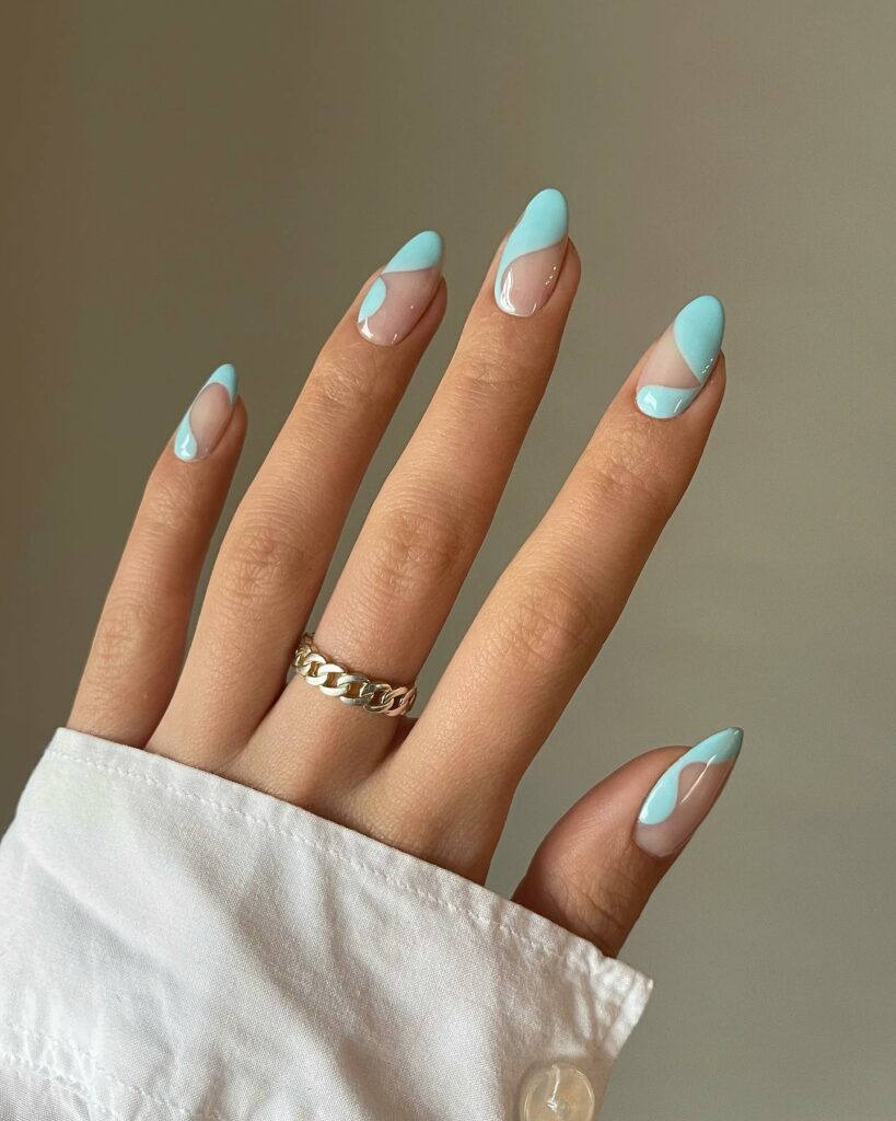 20 Latest Tiffany Blue Nail Ideas To Try In 2024! 11 Tiffany Blue Abstract Almond Nails