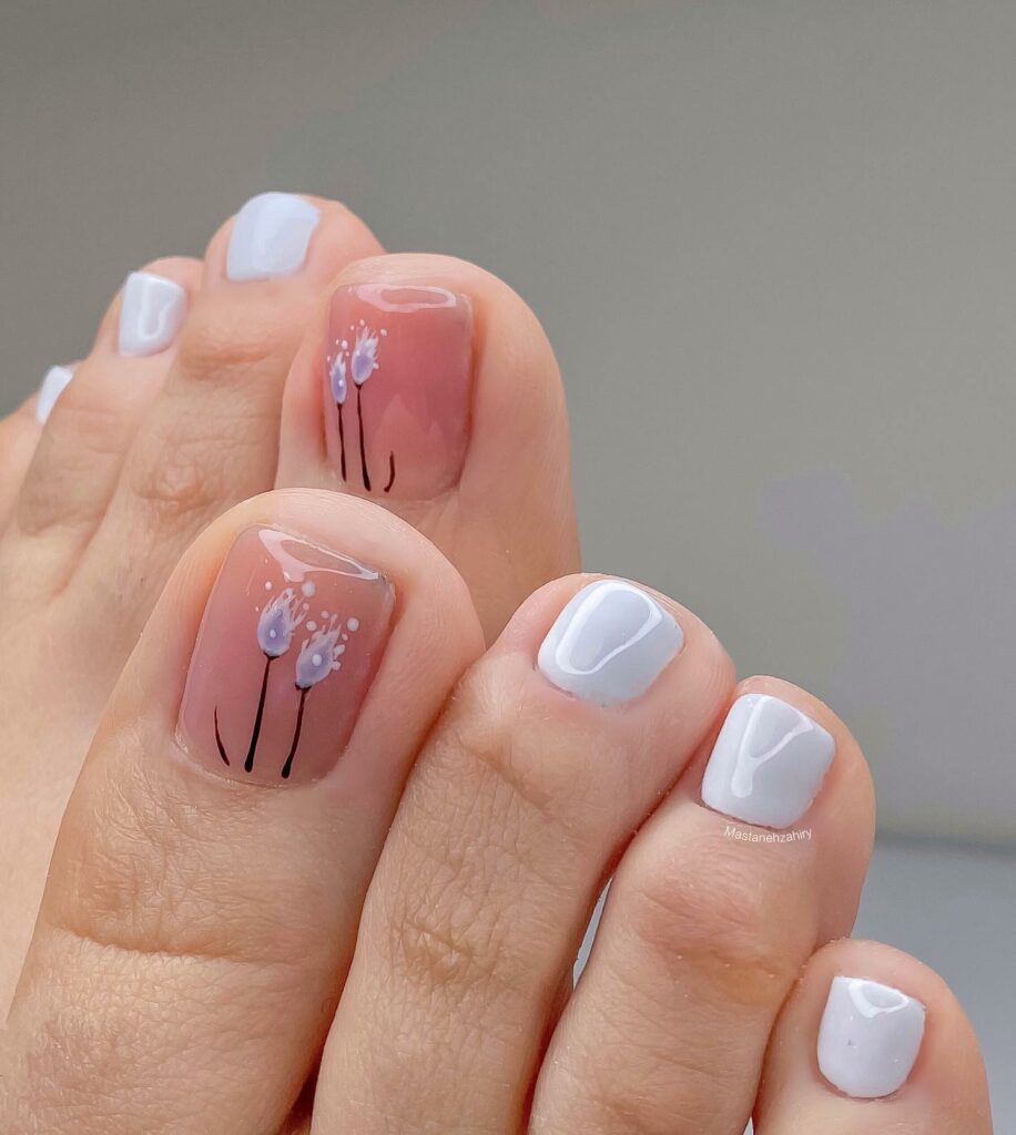 20 Latest Flower Pedicure Designs To Try In 2024! 24 White Accent Pedicure With White Flower Design