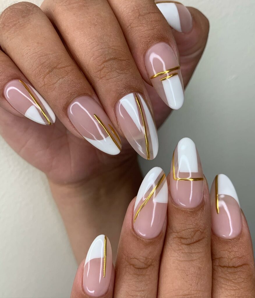 30 Latest White And Gold Nail Ideas To Try In 2024! 13 Geometric White And Gold Nails
