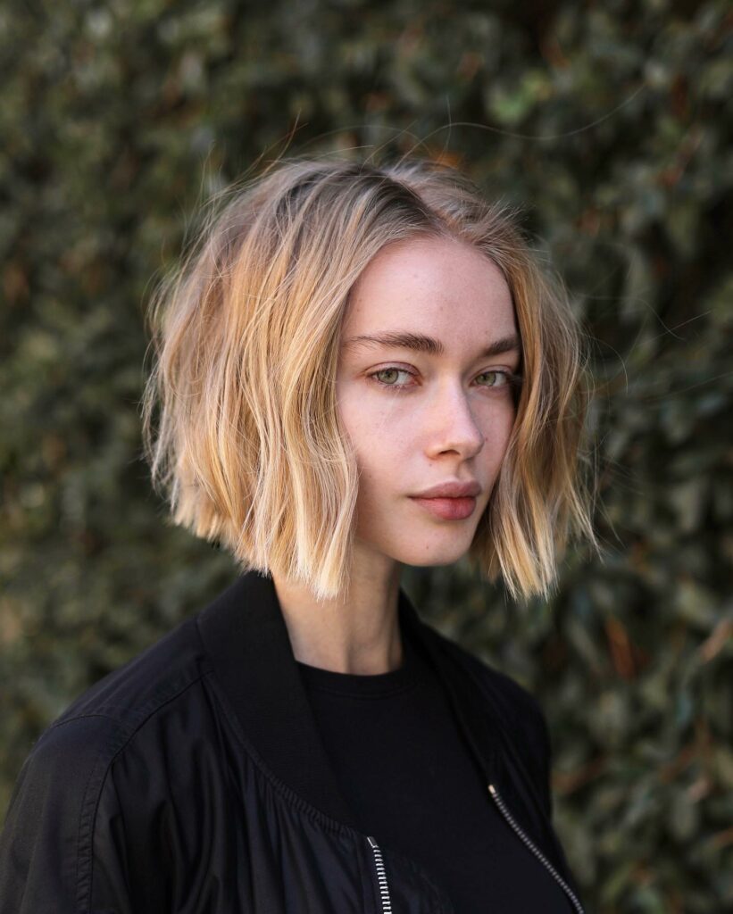 25 Short Layered Haircut Ideas to Revamp Your Look in 2024 23 Soft Blunt Shoulder Cut