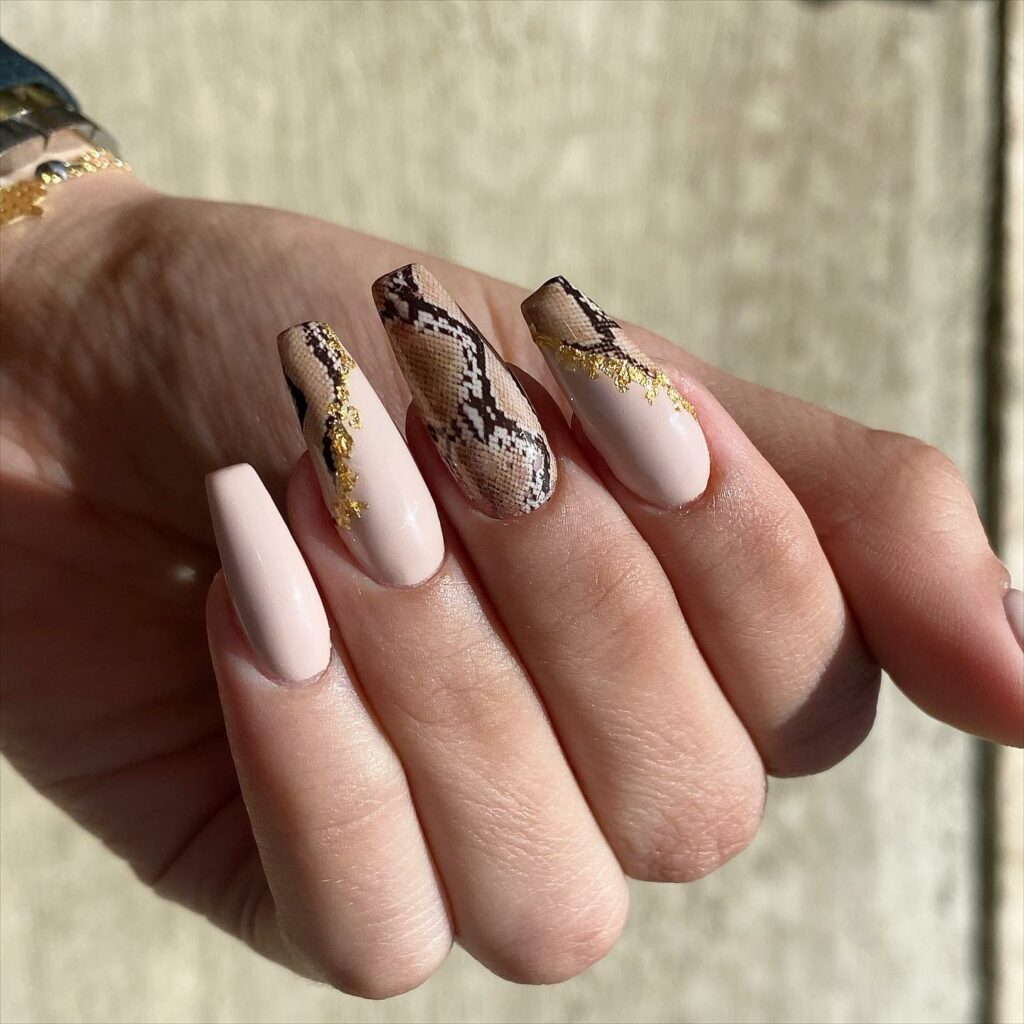 30 Latest Snake Nail Designs To Try In 2024! 22 Realistic Snake Skin On A Pink Coffin Nails With Gold Flakes