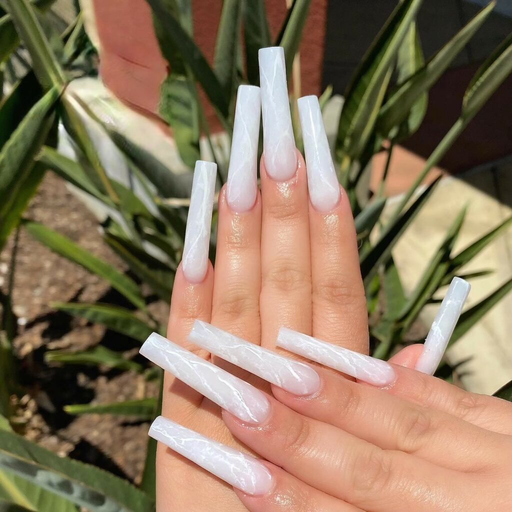 Embrace Elegance with 15 White Marble Nail Designs in 2024 13 White Marble Long Nails