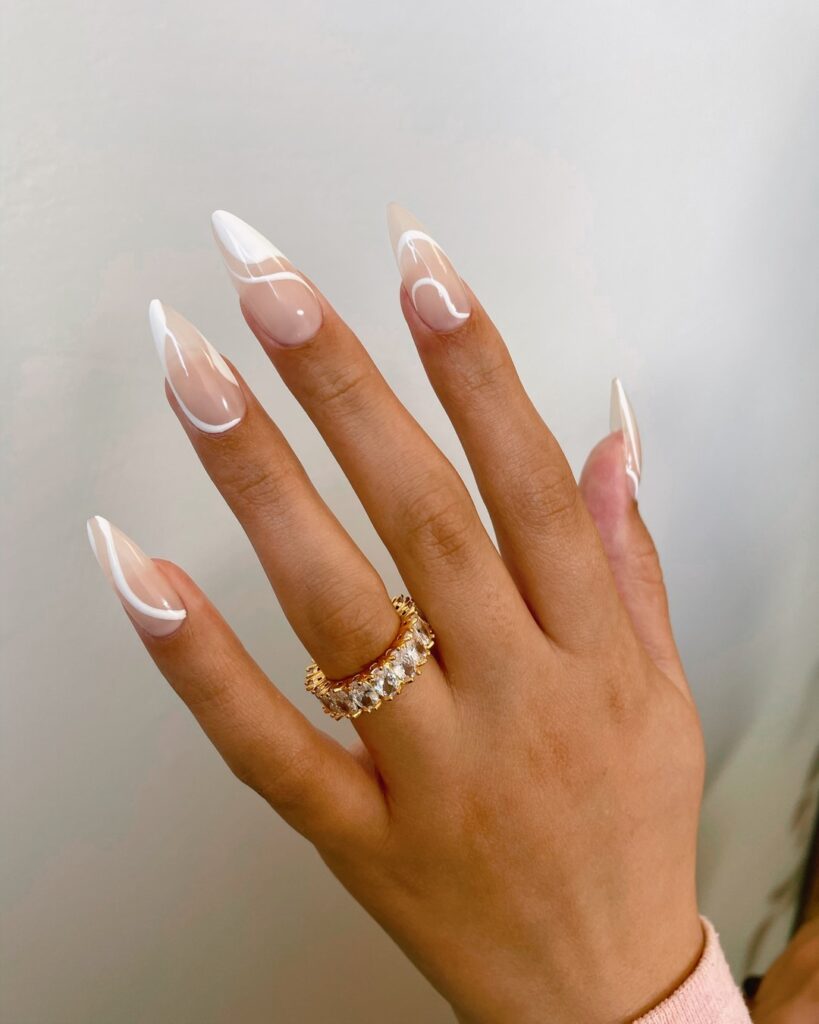 28 Latest Nude And White Nail Designs To Try in 2024! 13 Abstract White Swirl Nails