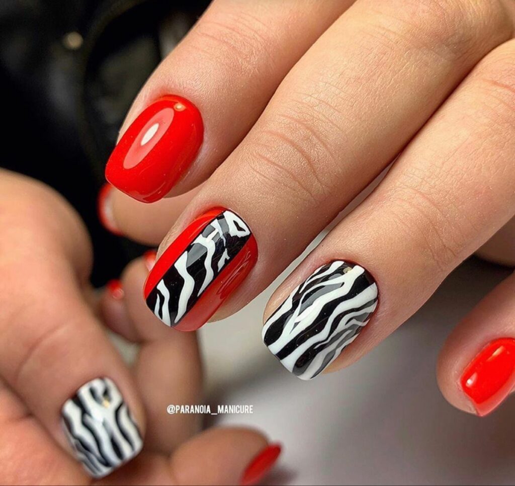 20 LATEST WILD STRIPE NAIL DESIGNS TO TRY IN 2024! 21 Wild Stripe Design On Red Almond Nails