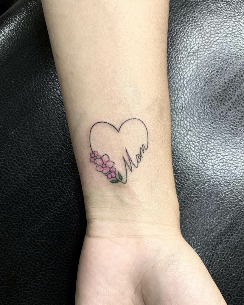 11+ Heart and Flower Tattoo Ideas That Will Blow Your Mind! 19 Lettered Heart And Flower Tattoo