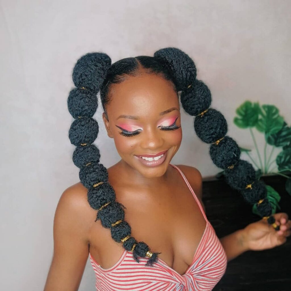 25 Bubble Braids Ideas to Try in 2024 23 Two Kinky Bubble Ponytails