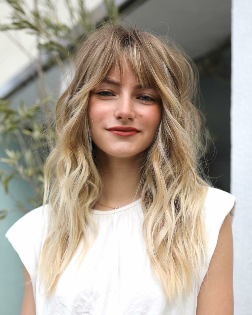 45 Wispy Long Curtain Bang Hairstyles to Try in 2024 34 Classic Long Shag with Wispy Bangs