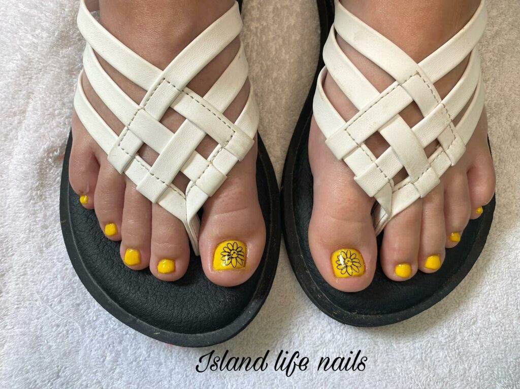 20 Latest Flower Pedicure Designs To Try In 2024! 21 Sunflower Design On Yellow Base Pedicure