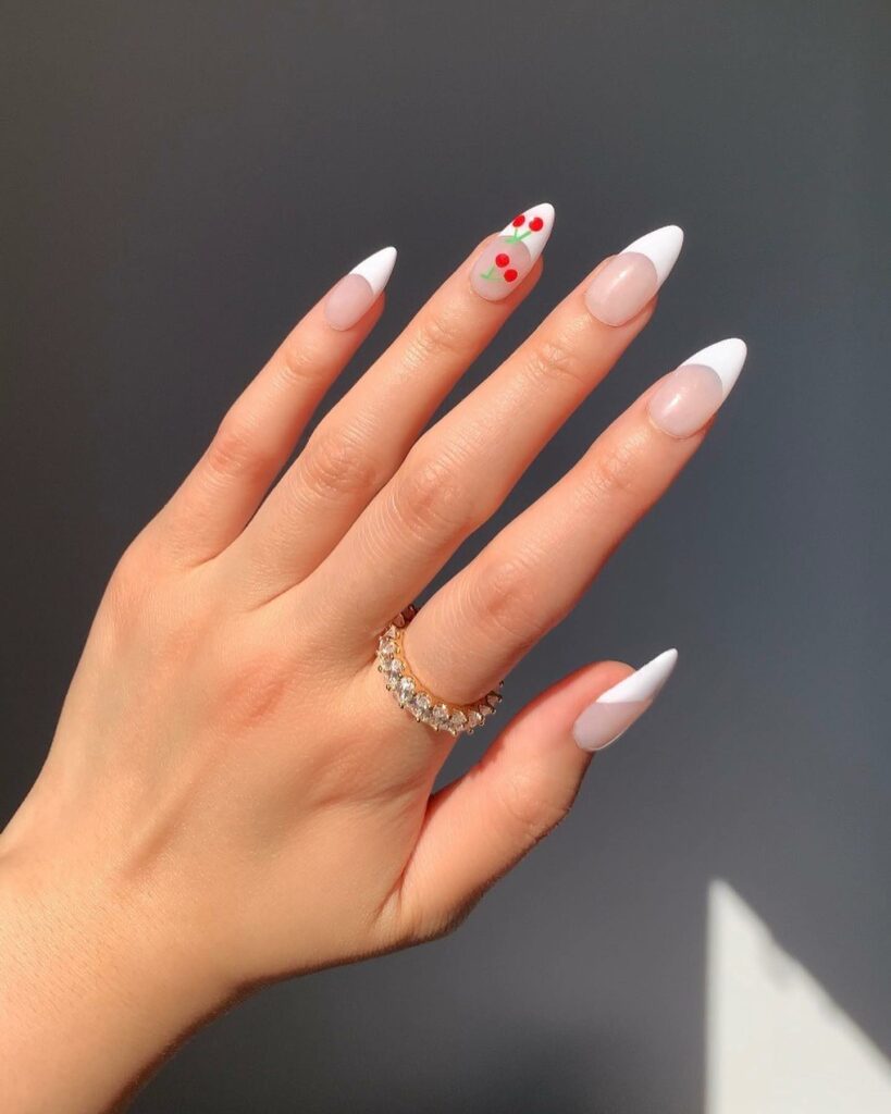 25 Latest Accent Nail Designs To Try In 2024! 16 White French Accent Nails With Cherry