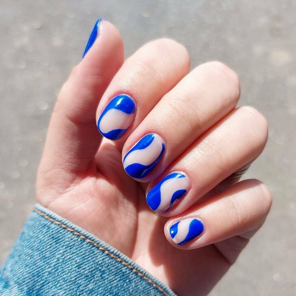 20 Latest Negative Space Nail Ideas To Try In 2024! 29 Negative Space Short Blue Nails