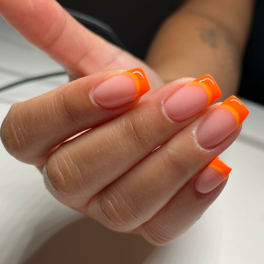 40 Latest Orange Nail Designs to Try in 2024 17 2-Tone Orange Tips