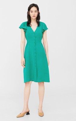 12 Pieces for a Hepburn-inspired Wardrobe 2 gallery Audrey items 12 Pieces for a Hepburn-inspired Wardrobe - Mango Ruffled midi dress $99.99