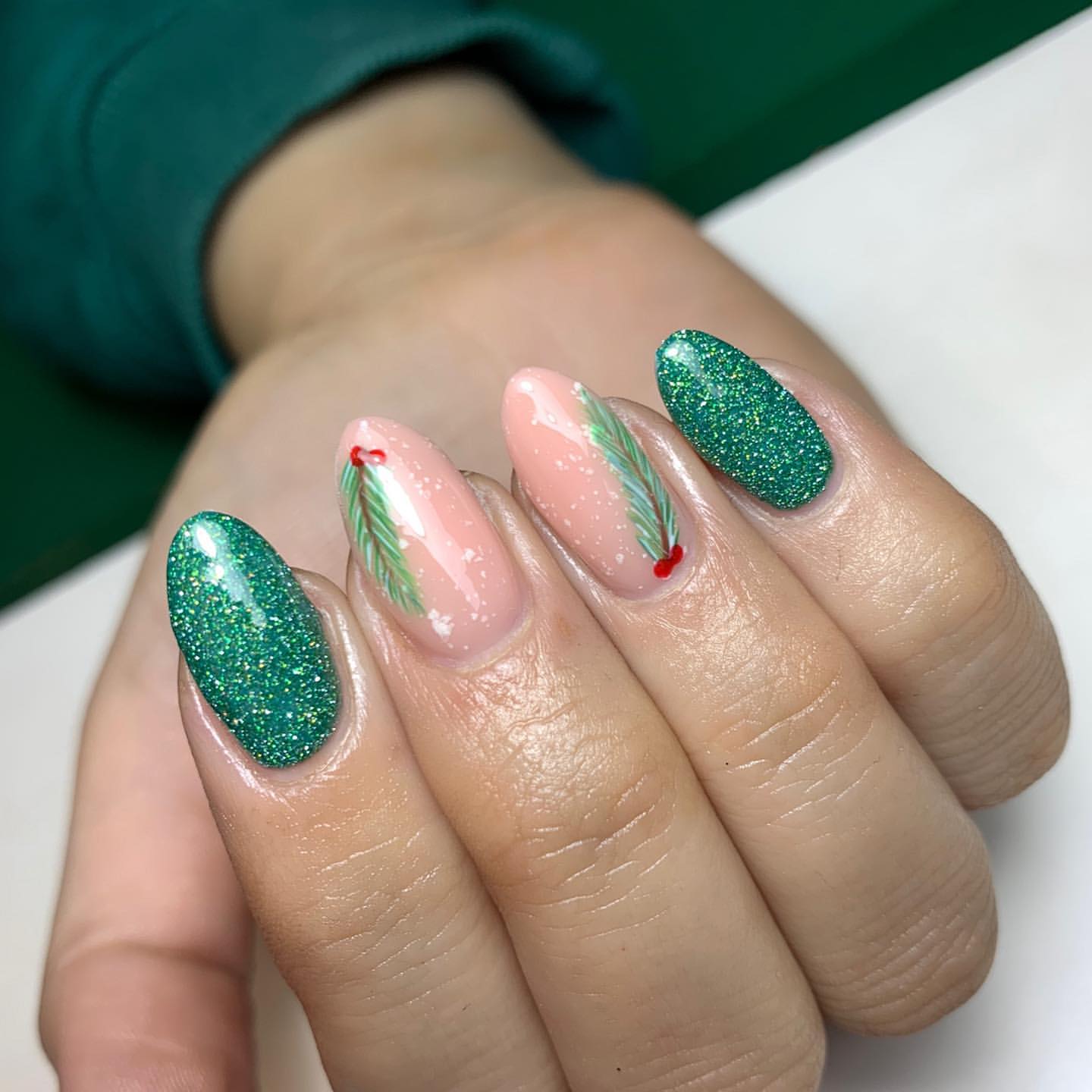 Get Festive with 25 Green Christmas Nail Ideas in 2024 32 Emerald Brilliance on Green Christmas Nails