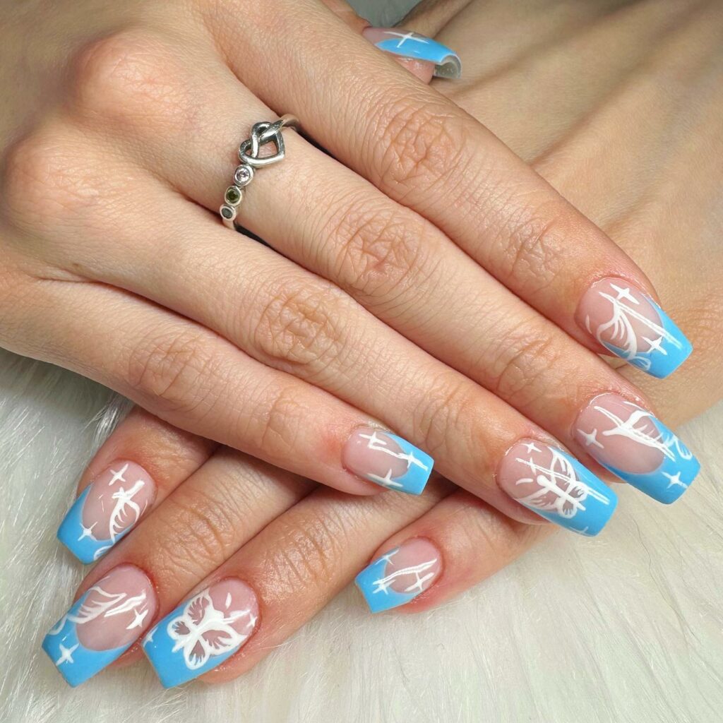50 Latest Butterfly Nail Designs To try In 2024! 49 Blue French and White Butterfly Nails