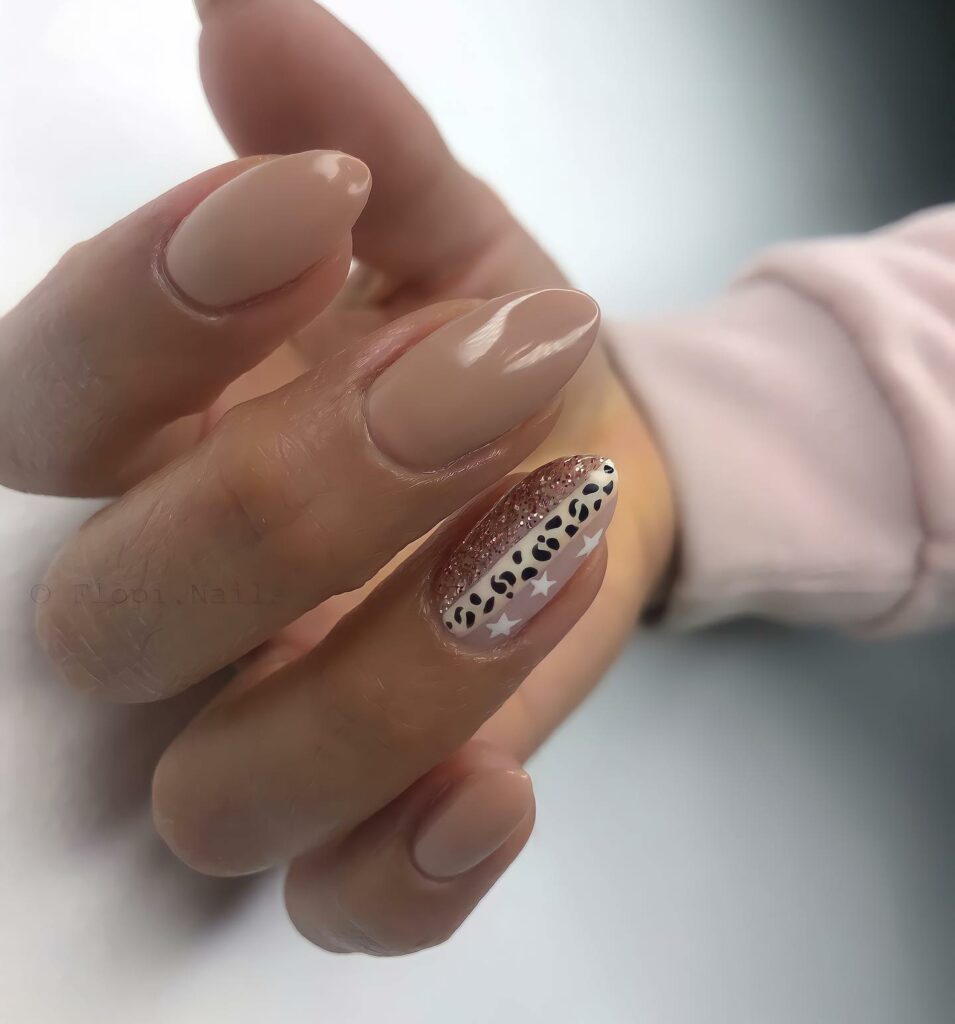Find Your Style with 28 Beige Nail Designs of 2024 26 Animal Print Nails with Bright Red Accent