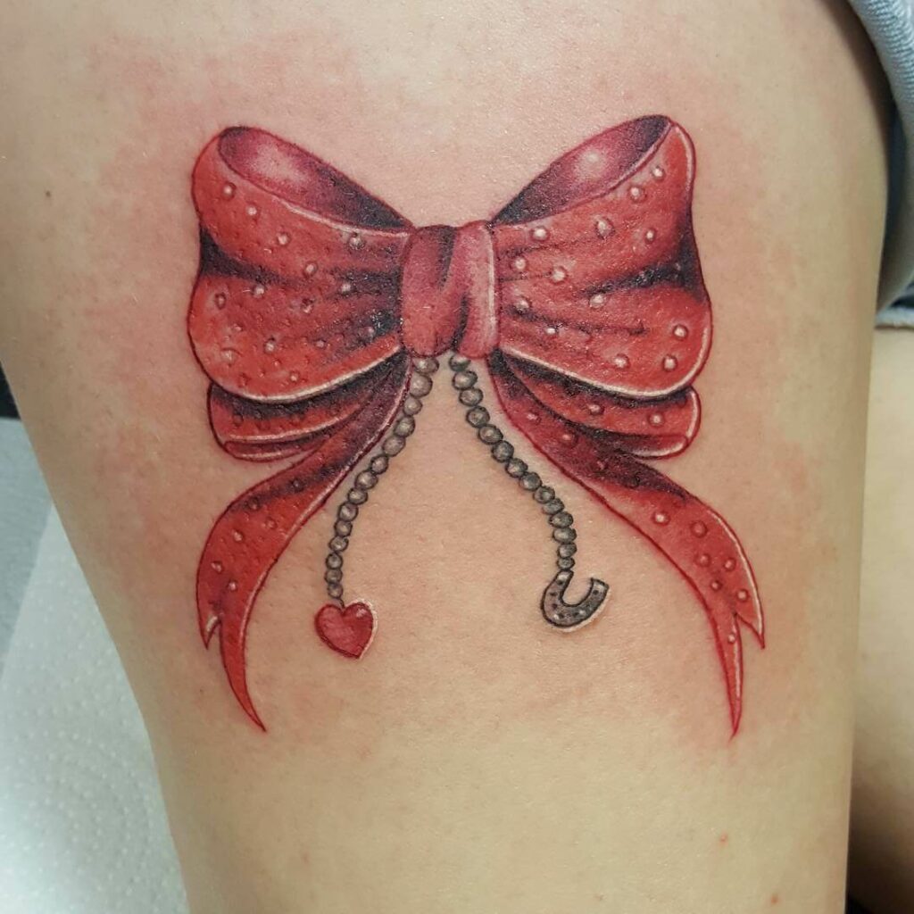 11+ Thigh Bow Tattoo Ideas That Will Blow Your Mind! 12 Red Bow Tattoo On Thigh With Minimal Designs