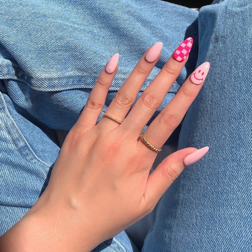 20 Latest Checkered Nail Designs To Try In 2024! 16 Pink Almond Checkered Nails With Smiley Design
