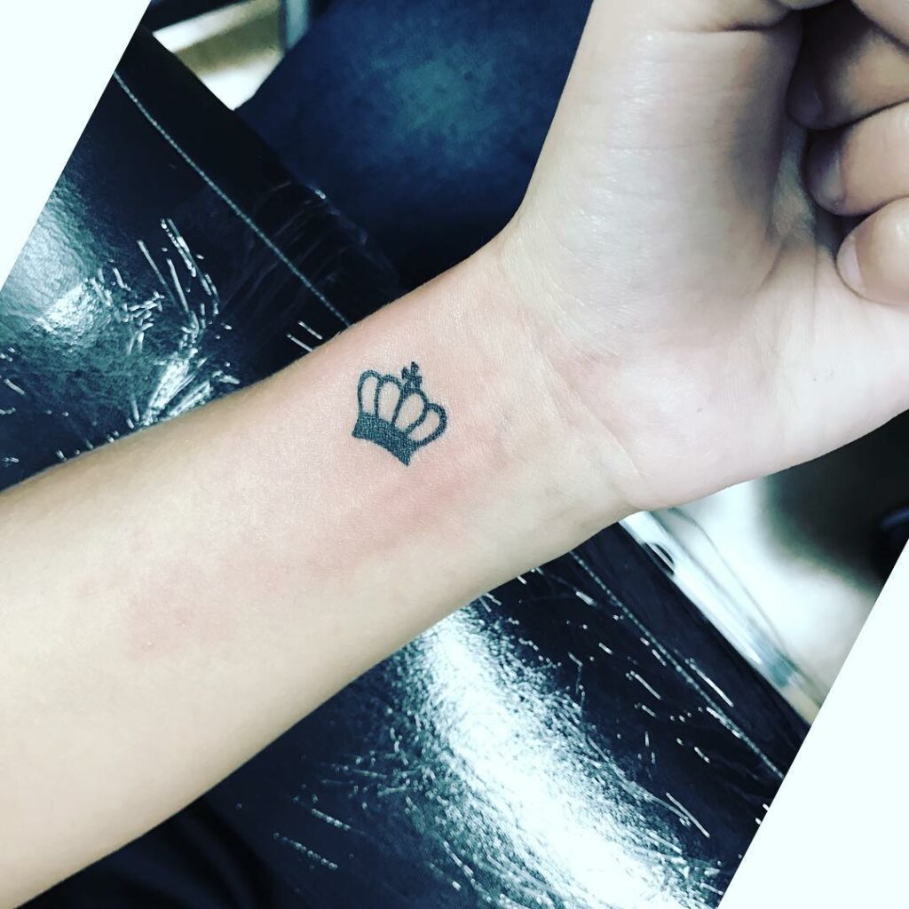 20+ AMAZING WRIST TATTOOS + MEANINGS IN 2024 32 Crown Wrist Tattoo