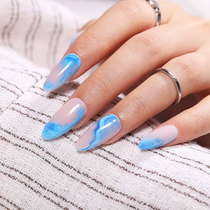 Feel Tropical with 35 Tropical Nails Designs for 2024 32 Blue Marble Nails