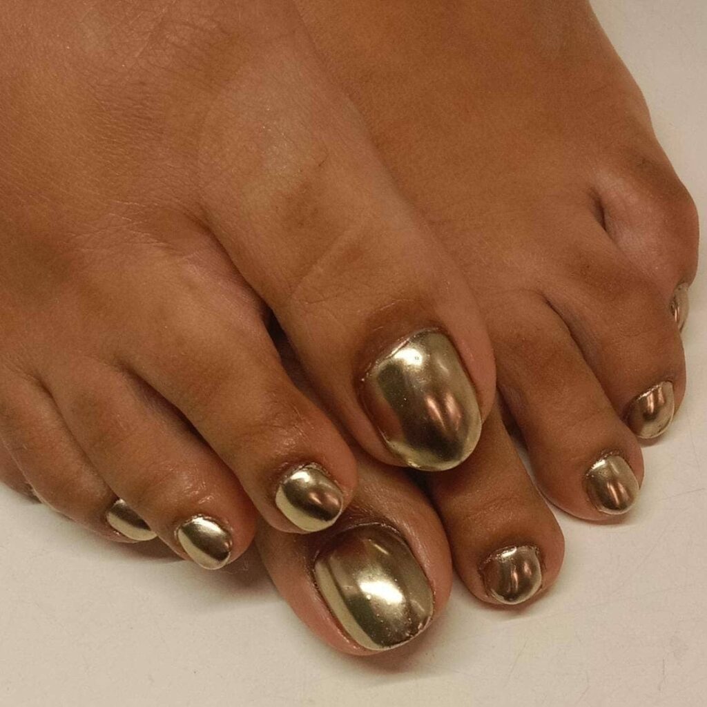 30 Gold Pedicure Ideas to Add Glamour to Your Look in 2024 16 Full Metallic Gold Pedicure