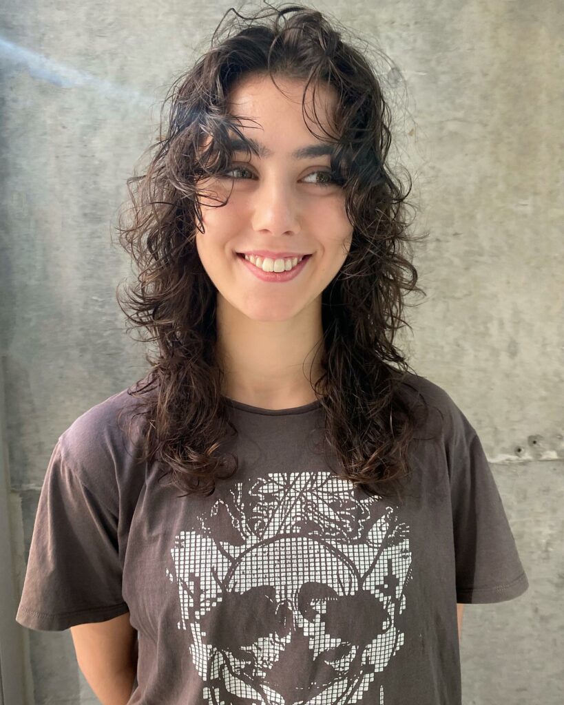 35 Long Wolf Cut Hairstyle Ideas to Try in 2024 36 Wolf Cut with Soft Curls