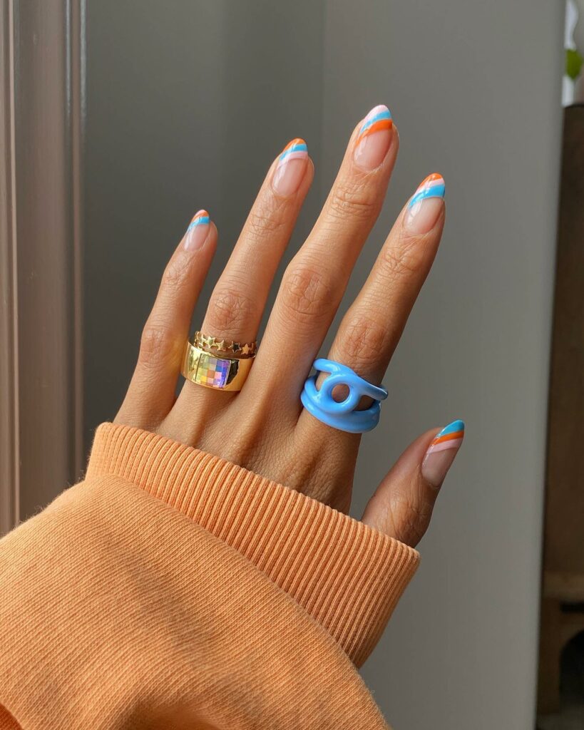 20 Latest Orange And Blue Nail Ideas To Try In 2024! 13 Orange And Blue French Nails