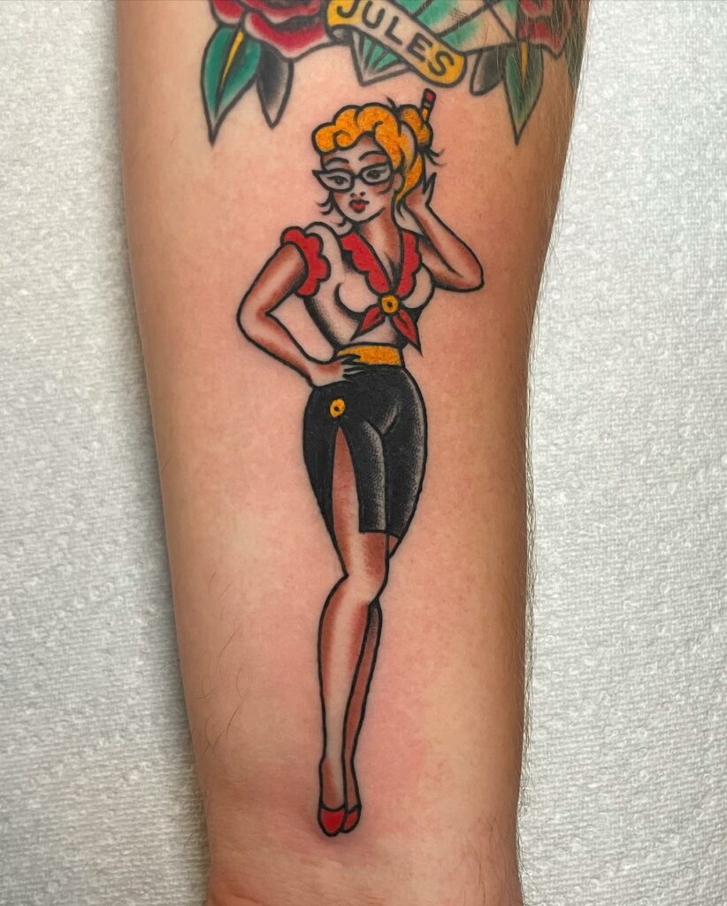 AMERICAN TRADITIONAL TATTOOS - THE ULTIMATE GUIDE FOR 2024 20 Pin up Girl Tattoos