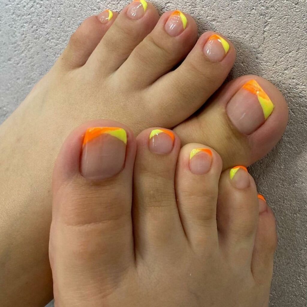 30 Yellow Pedicure Ideas to Brighten Up Your Look in 2024 19 Yellow And Orange Ombre Pedicure
