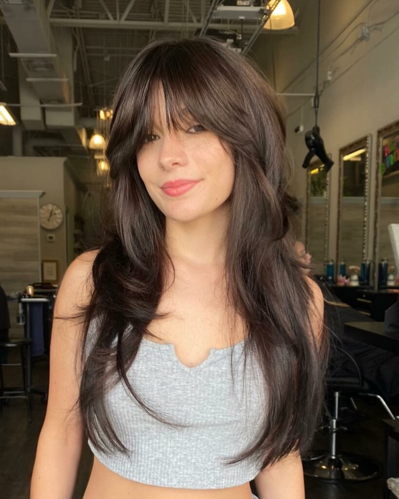 35 Long Wolf Cut Hairstyle Ideas to Try in 2024 20 Wolf Cut with Side Bangs