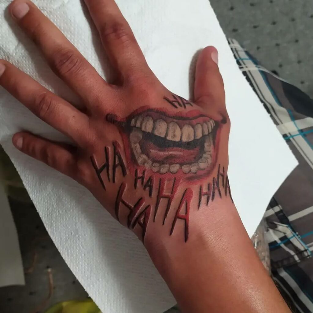 10+ Simple Joker Tattoo Ideas That Will Blow Your Mind! 20 Joker Smile Hand Tattoo