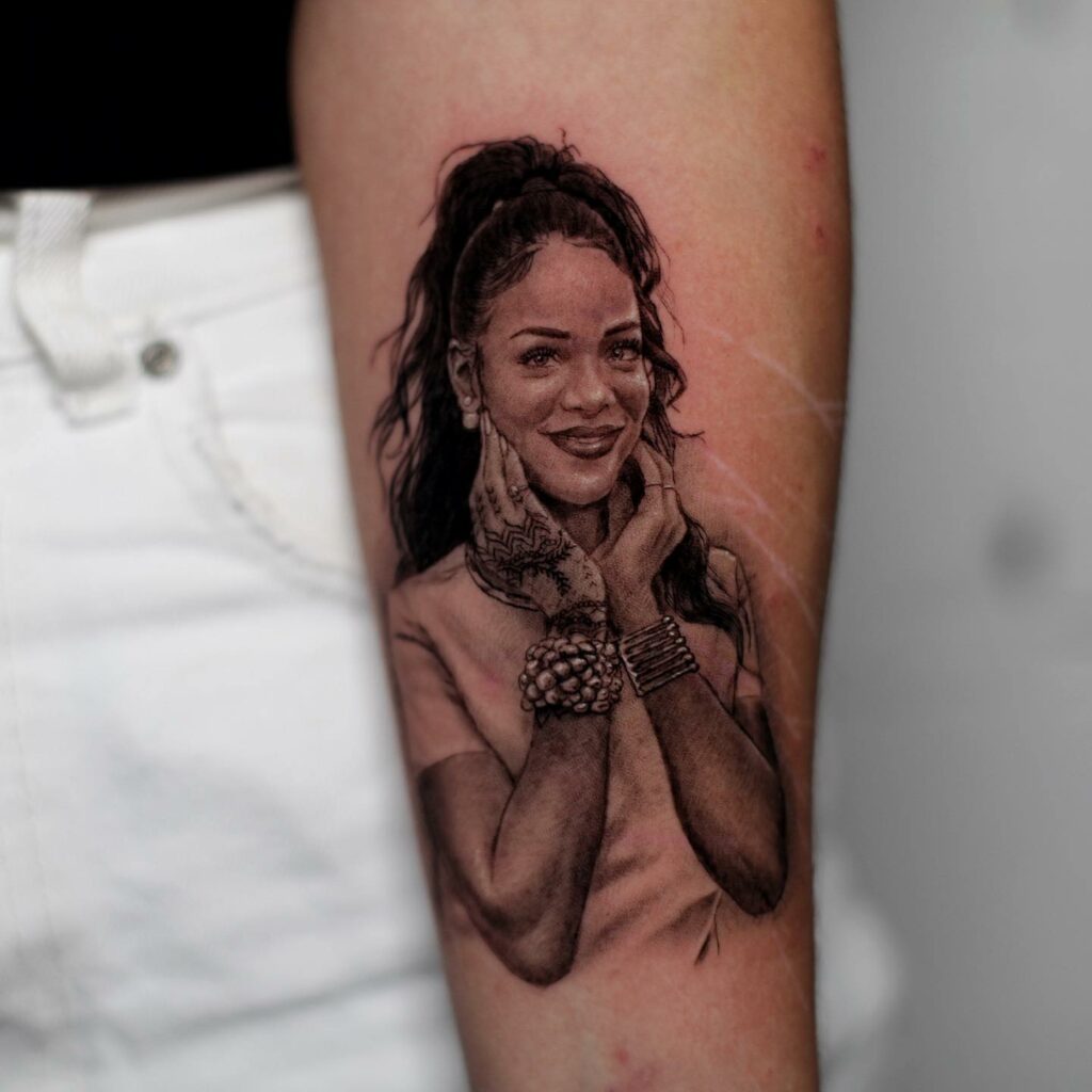 11+ Rihanna Drake Tattoo Ideas That Will Blow Your Mind! 14 Rihanna's Portrait Tattoo On Forearm
