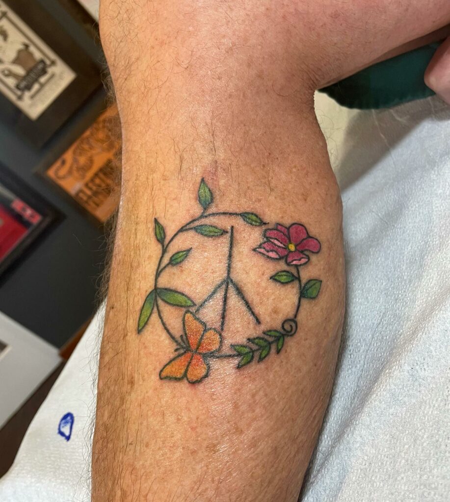 Top 20 Symbolic Tattoos For Men in 2024 21 Peace Sign
