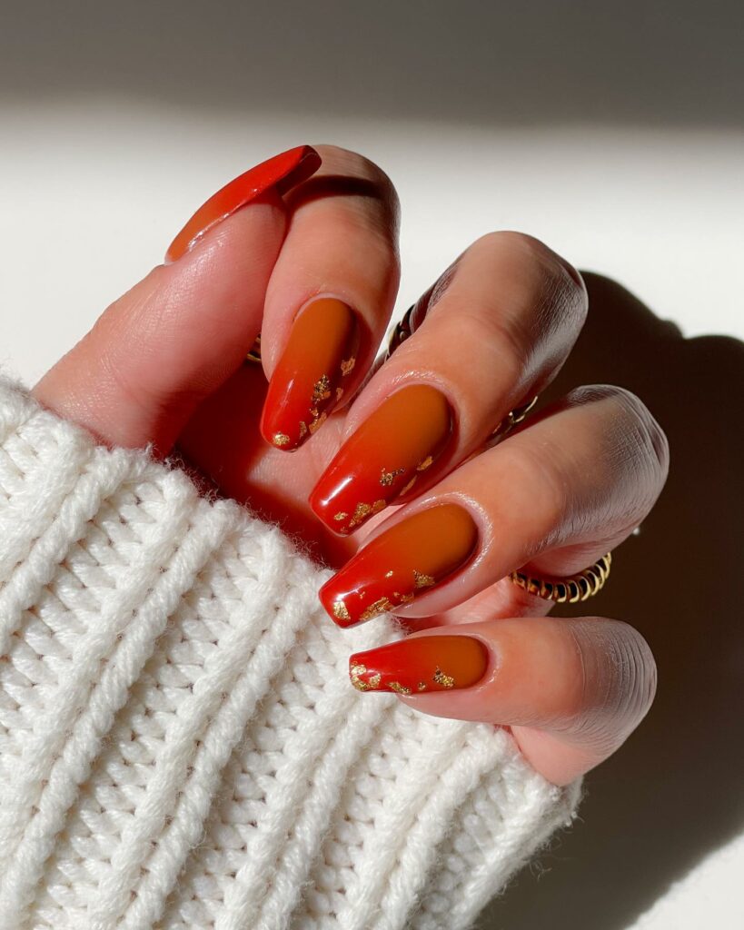 30 Latest Orange Ombre Nail Designs To Try In 2024! 44 Brown And Dark Orange Ombre Nails With Gold Flakes